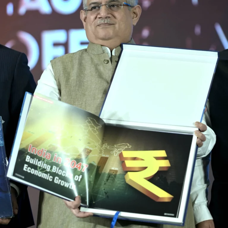 Sandip Patel, Managing Director of IBM India & South Asia, unveiling the coffee table book - The Indian BFSI Story.