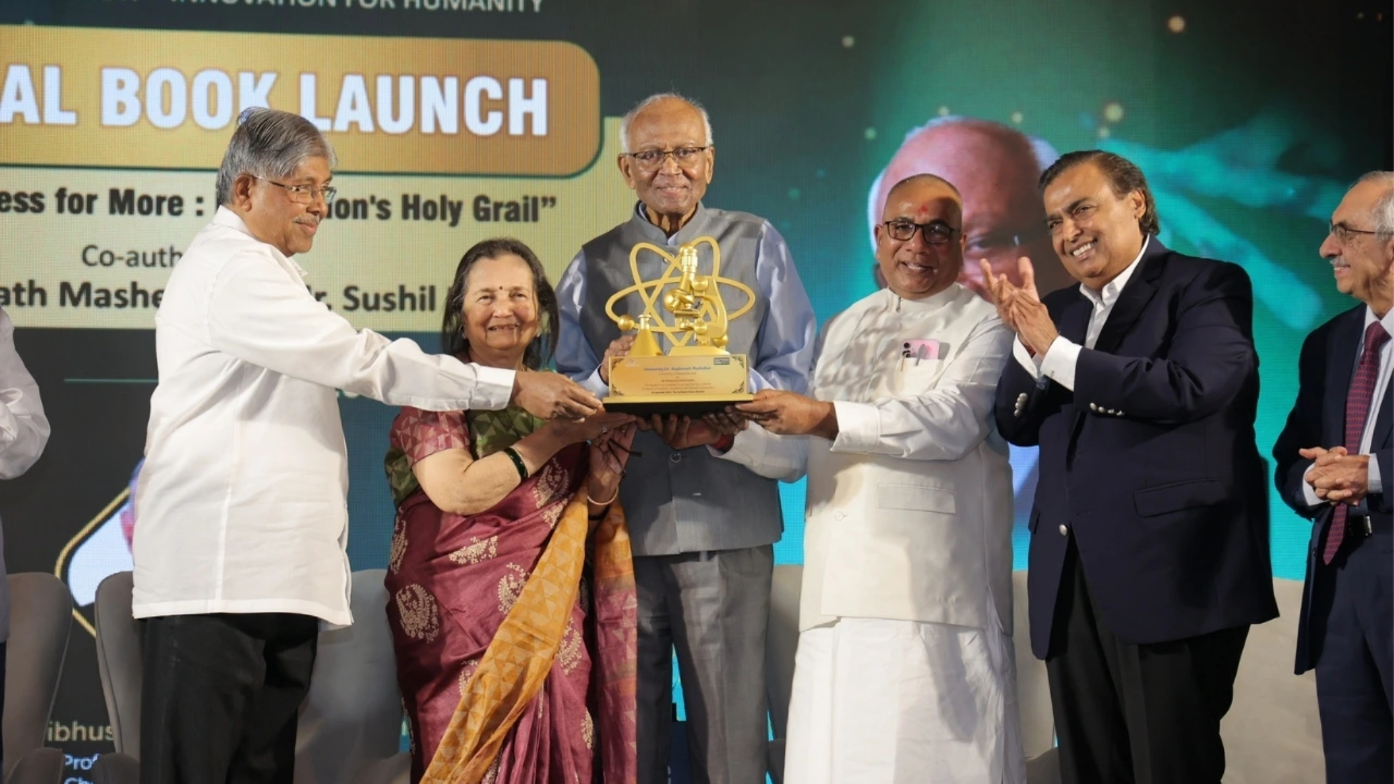 Dr. Raghunath Mashelkar being felicitated by the Chief Guest, Shri Chandrakant Patil; Guest of Honour, Mr. Mukesh Ambani; and Host, Mr. Kripa Shankar Tiwari, in recognition of his historic achievement of receiving 54 honorary doctorates - the highest ever conferred upon an engineering scientist- marking a moment of profound national pride as he surpasses the record of Former President of India, Dr. A. P.J. Abdul Kalam, who received 48 honorary doctorates. Dr. Mashelkar was joined on the dais by his wife, Smt. Vaishali Mashelkar, during the ceremony.