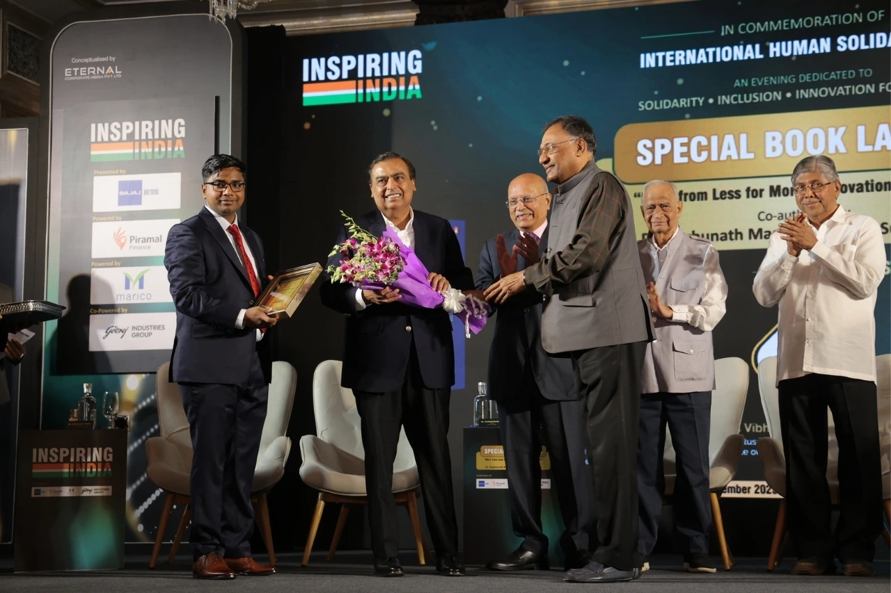 Mr. Niraj Bajaj, Chairman of Bajaj Auto Limited, and Mr. Alok Ranjan Tiwari, Managing Director & CEO of Eternal Corporate Media Private Limited, welcoming and felicitating the Guest of Honour, Mr. Mukesh Ambani, Chairman & Managing Director, Reliance Industries Limited.