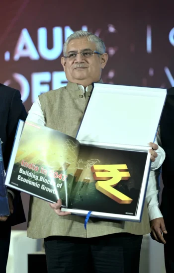 Sandip Patel, Managing Director of IBM India & South Asia, unveiling the coffee table book - The Indian BFSI Story.